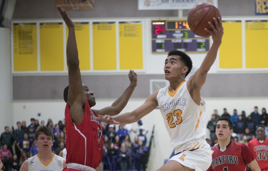 Lemoore's Joemyl Ragunton will help lead his Tigers to a first-round match-up at Tulare Union on Tuesday, Feb. 20